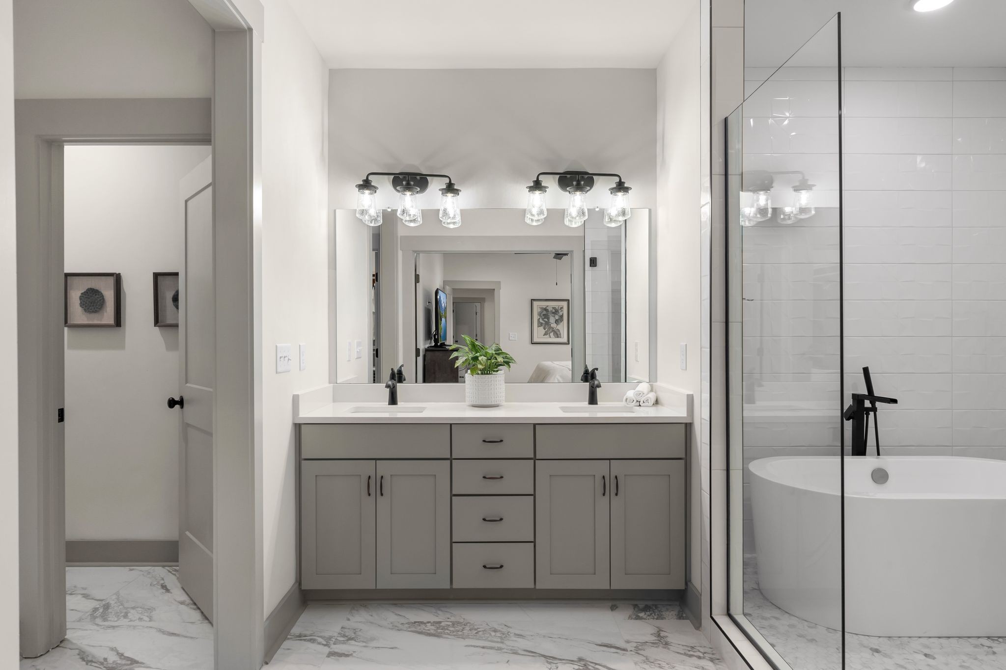 2660 Barclay Drive, Unit B Nashville, TN 37206 - Photo 20 of 29 a bathroom with a double vanity sink and a mirror