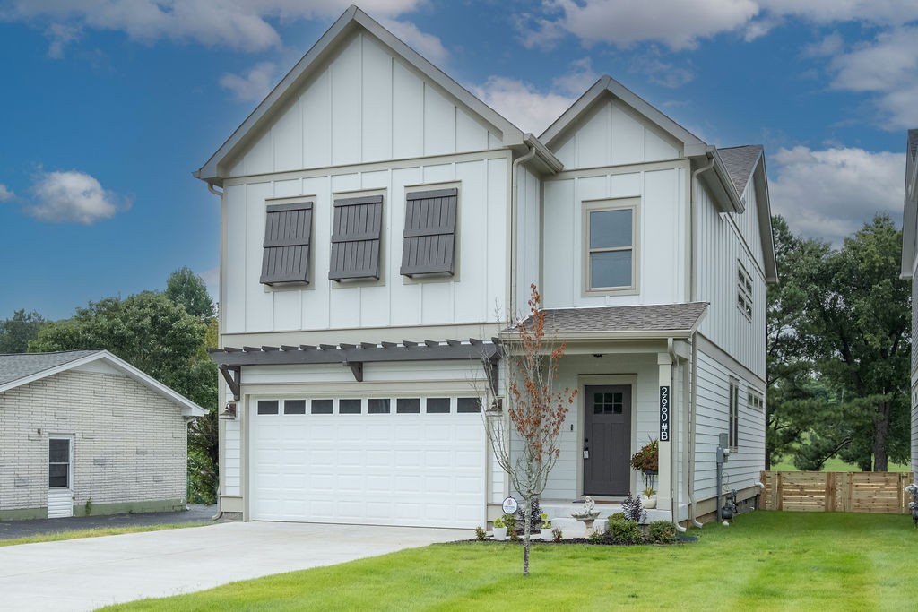2660 Barclay Drive, Unit B Nashville, TN 37206 - Photo 2 of 29 a front view of a house with a yard