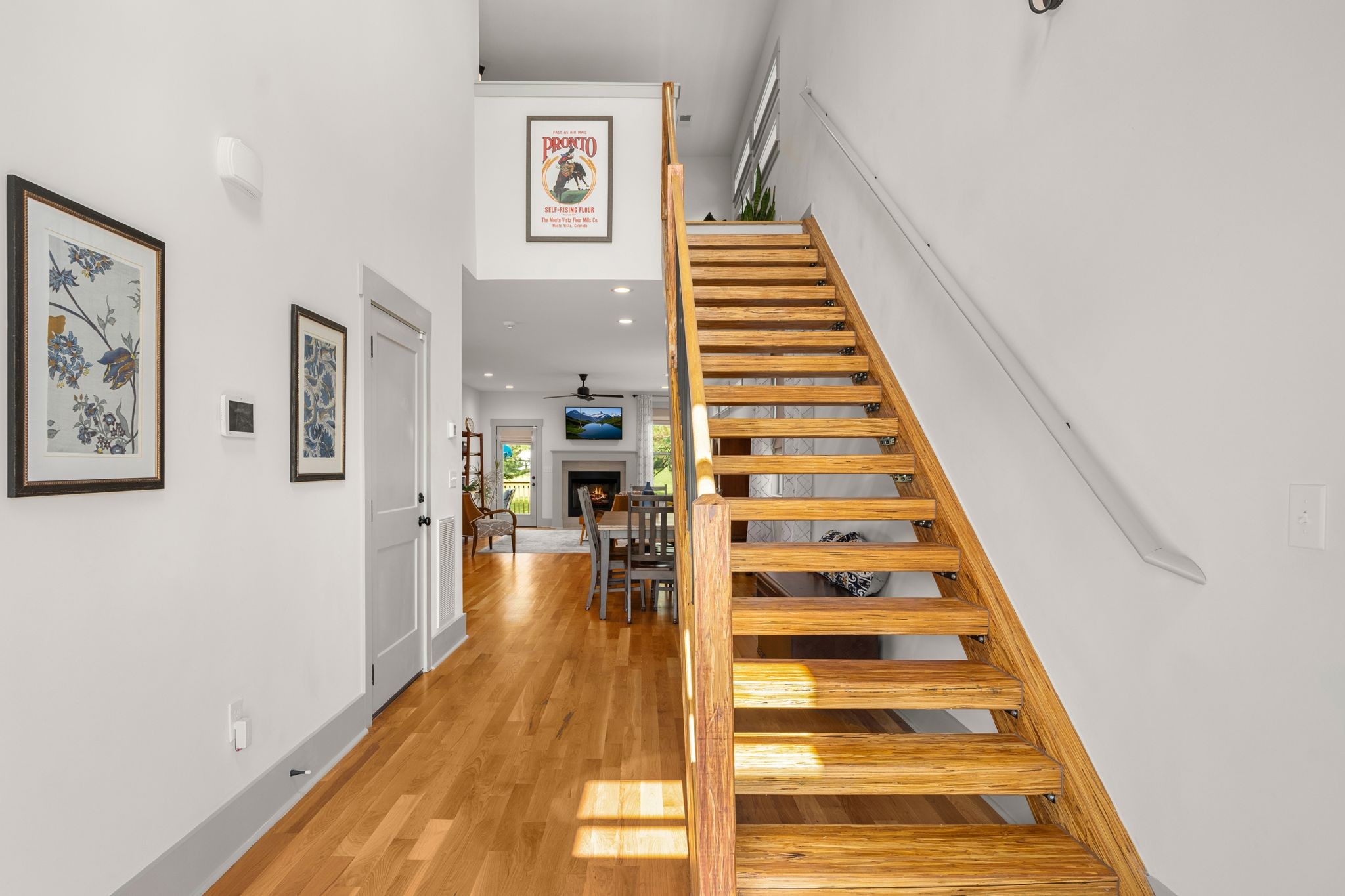 2660 Barclay Drive, Unit B Nashville, TN 37206 - Photo 3 of 29 a view of a hallway with wooden floor and stairs