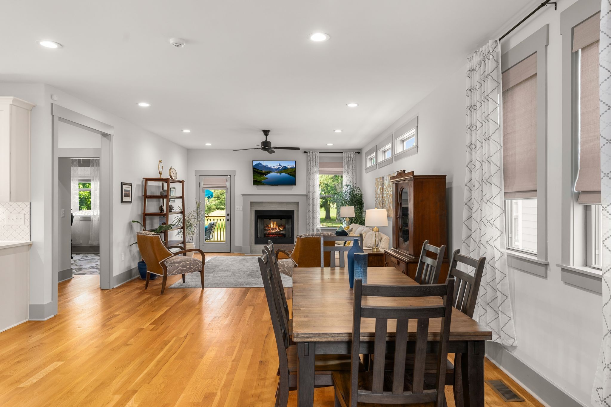 2660 Barclay Drive, Unit B Nashville, TN 37206 - Photo 4 of 29 a living room with furniture a fireplace and a flat screen tv