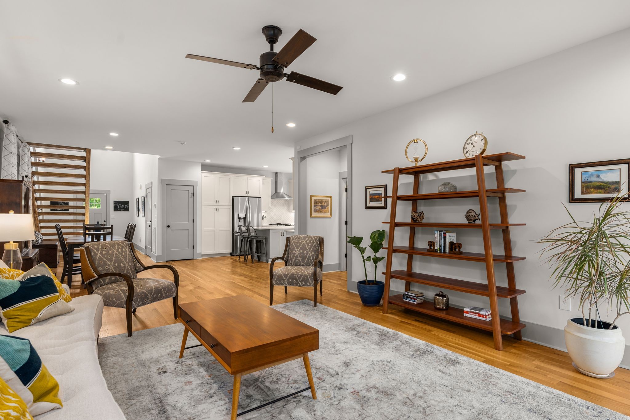2660 Barclay Drive, Unit B Nashville, TN 37206 - Photo 6 of 29 a living room with furniture a rug and a potted plant