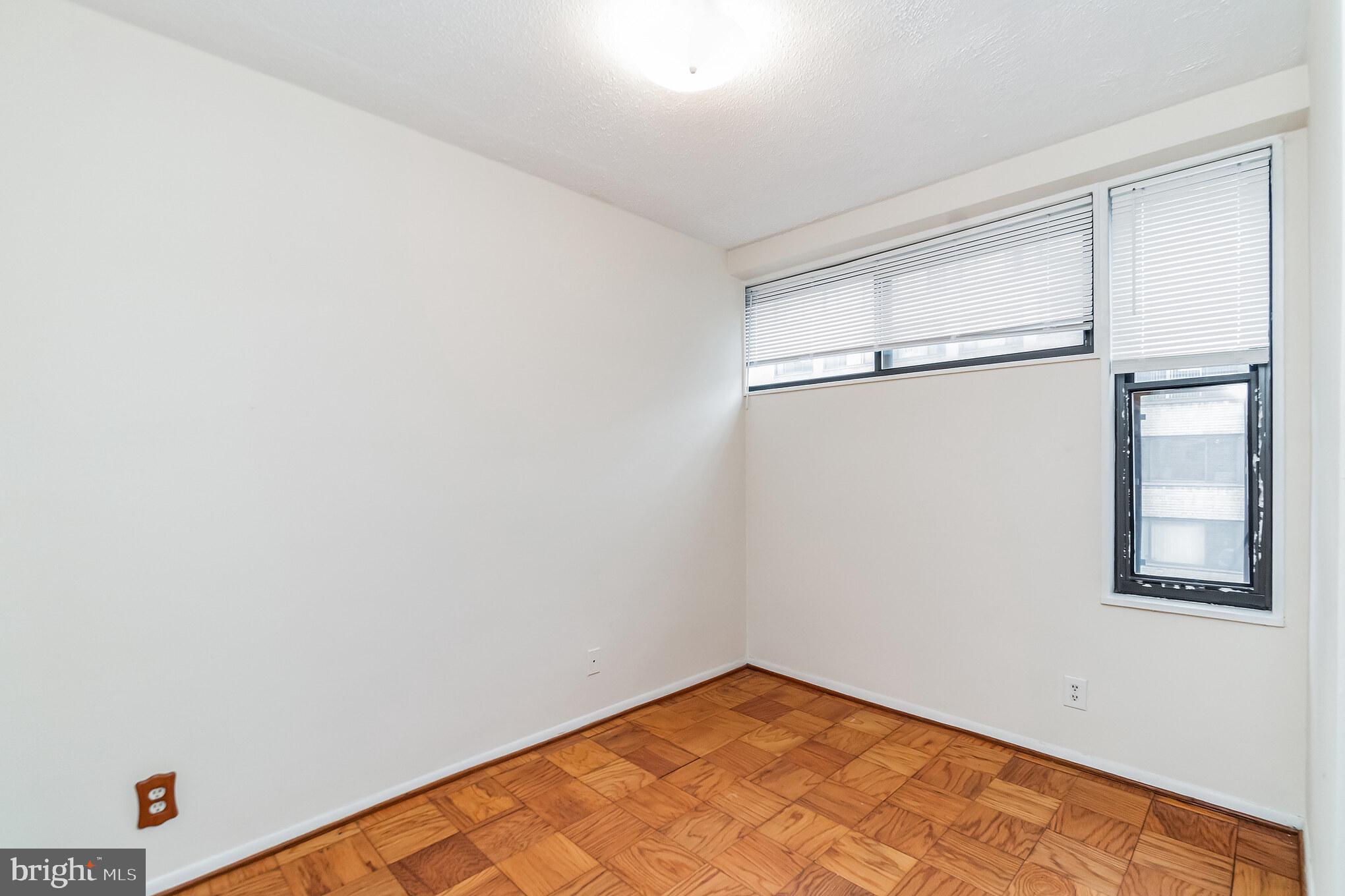 1420 N Street Northwest, Unit 605 Washington, DC 20005 - Photo 9 of 14 a view of an empty room