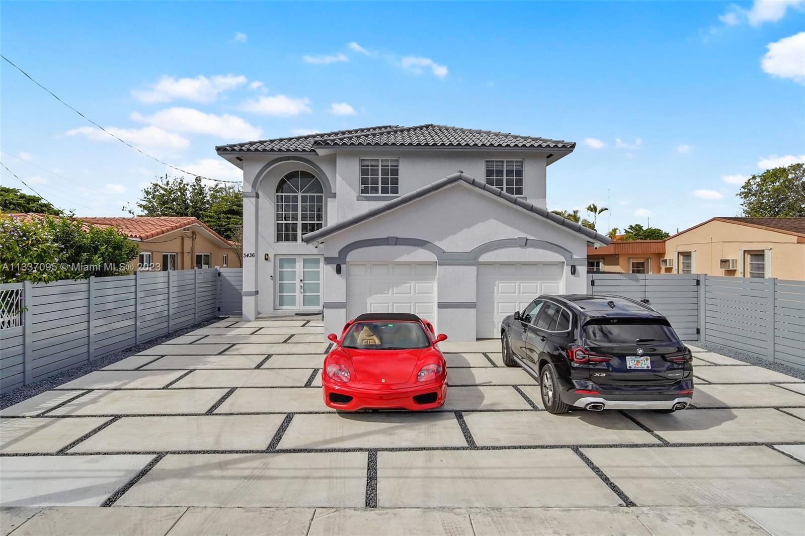 3436 Southwest 88th Place Miami, FL 33165 - Photo 1 of 43 a car parked in front of a house