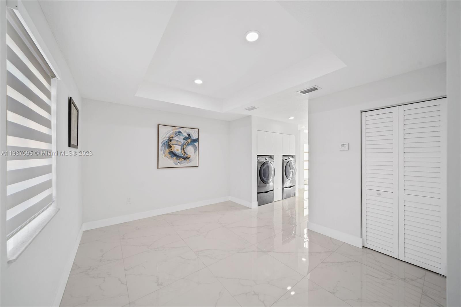 3436 Southwest 88th Place Miami, FL 33165 - Photo 13 of 43 a view of a kitchen with a sink and a window
