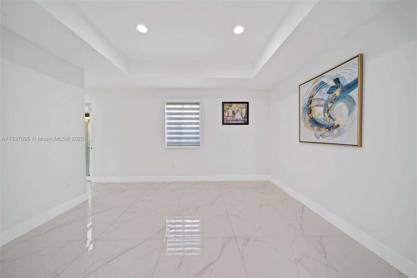 3436 Southwest 88th Place Miami, FL 33165 - Photo 14 of 43 an empty room with windows