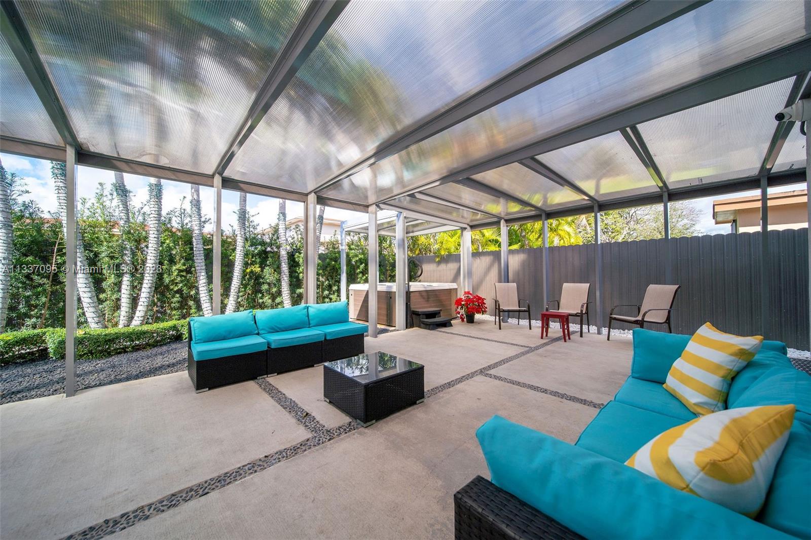 3436 Southwest 88th Place Miami, FL 33165 - Photo 19 of 43 a outdoor living space with furniture and garden view