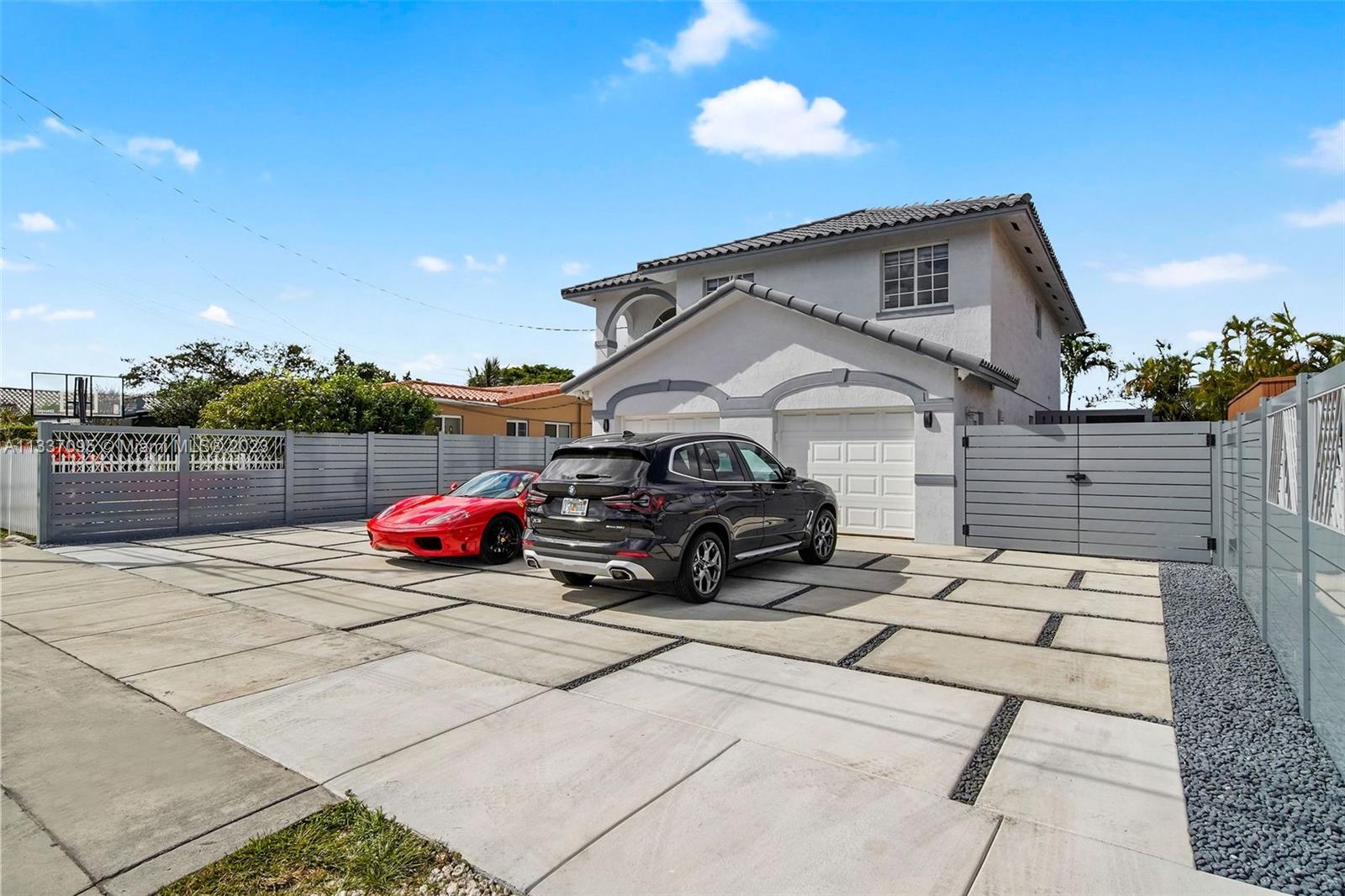 3436 Southwest 88th Place Miami, FL 33165 - Photo 2 of 43 a view of a car in front of house