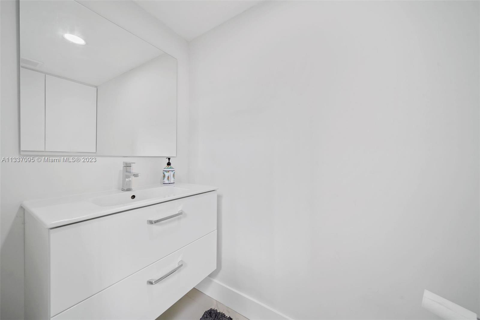 3436 Southwest 88th Place Miami, FL 33165 - Photo 26 of 43 a utility room with dryer and washer