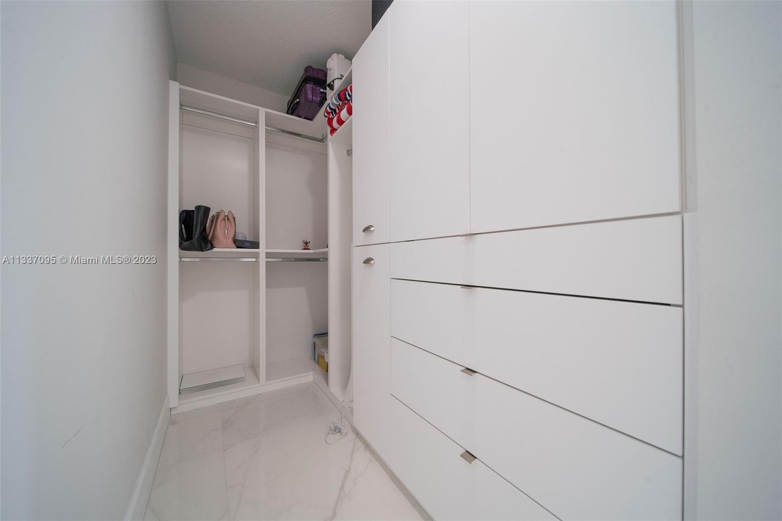 3436 Southwest 88th Place Miami, FL 33165 - Photo 33 of 43 a view of an empty walk in closet