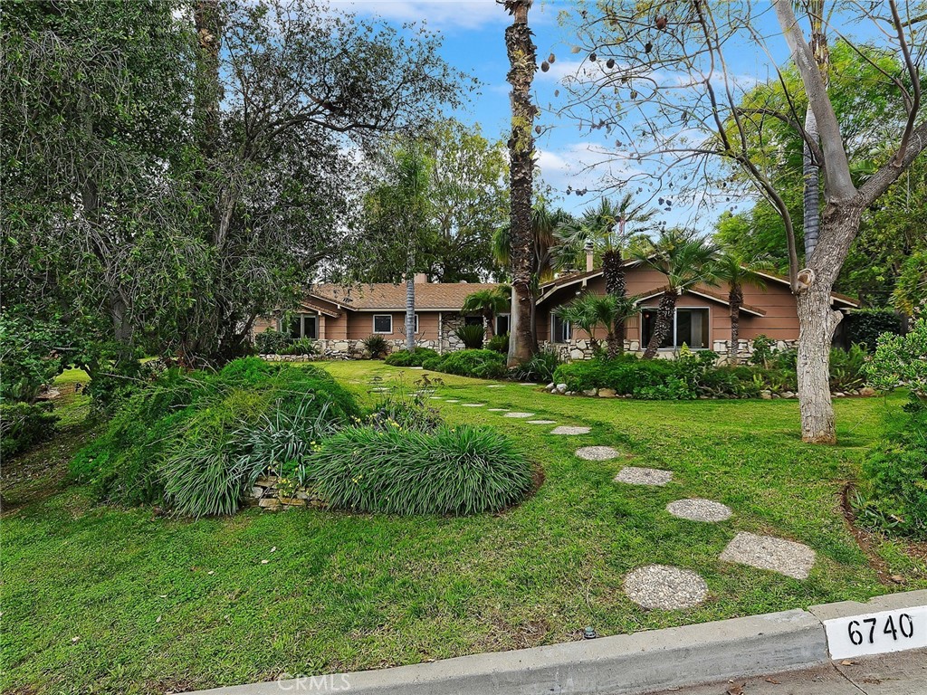 6740 Sunset Circle Riverside, CA 92505 - Photo 1 of 1 a house view with a garden space