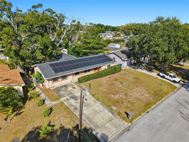 a view of a pool with a yard