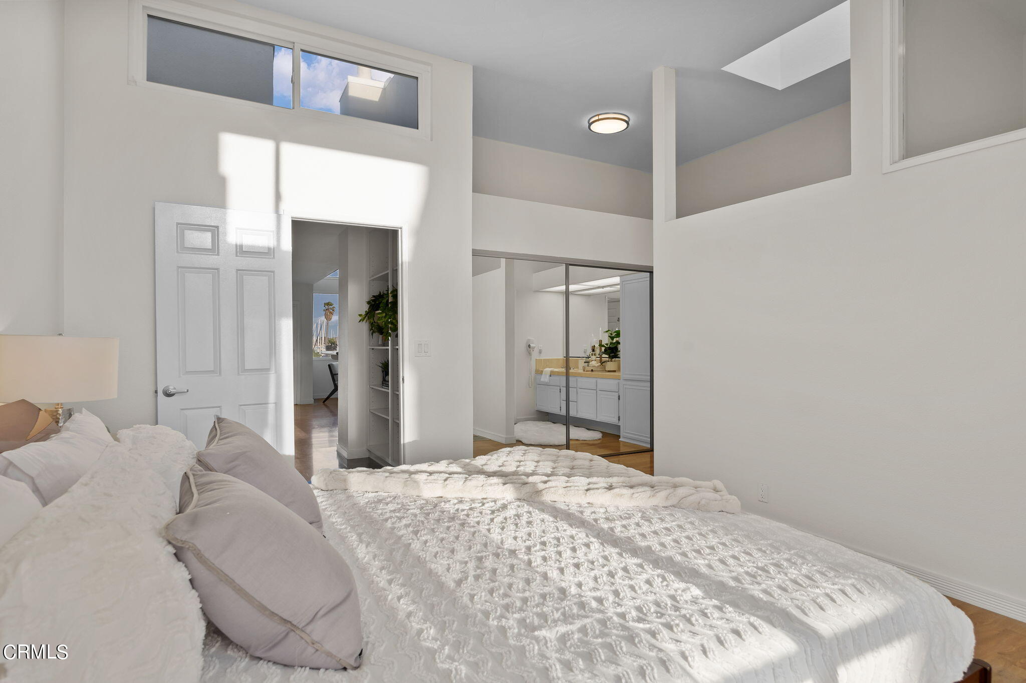 3547 Sunset Lane Oxnard, CA 93035 - Photo 13 of 24 a bedroom with a bed and a mirror