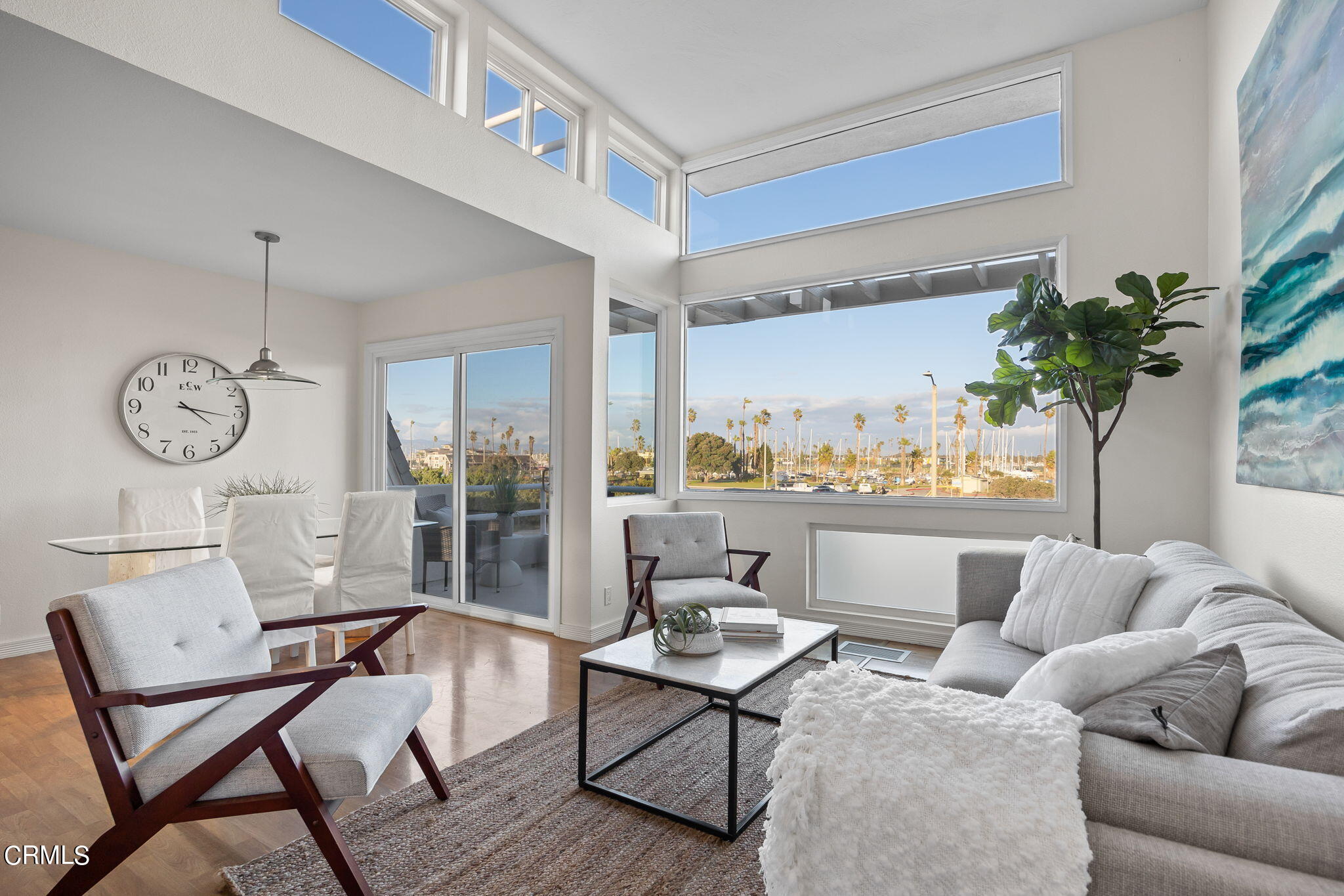 3547 Sunset Lane Oxnard, CA 93035 - Photo 3 of 24 a living room with furniture a table and a large window