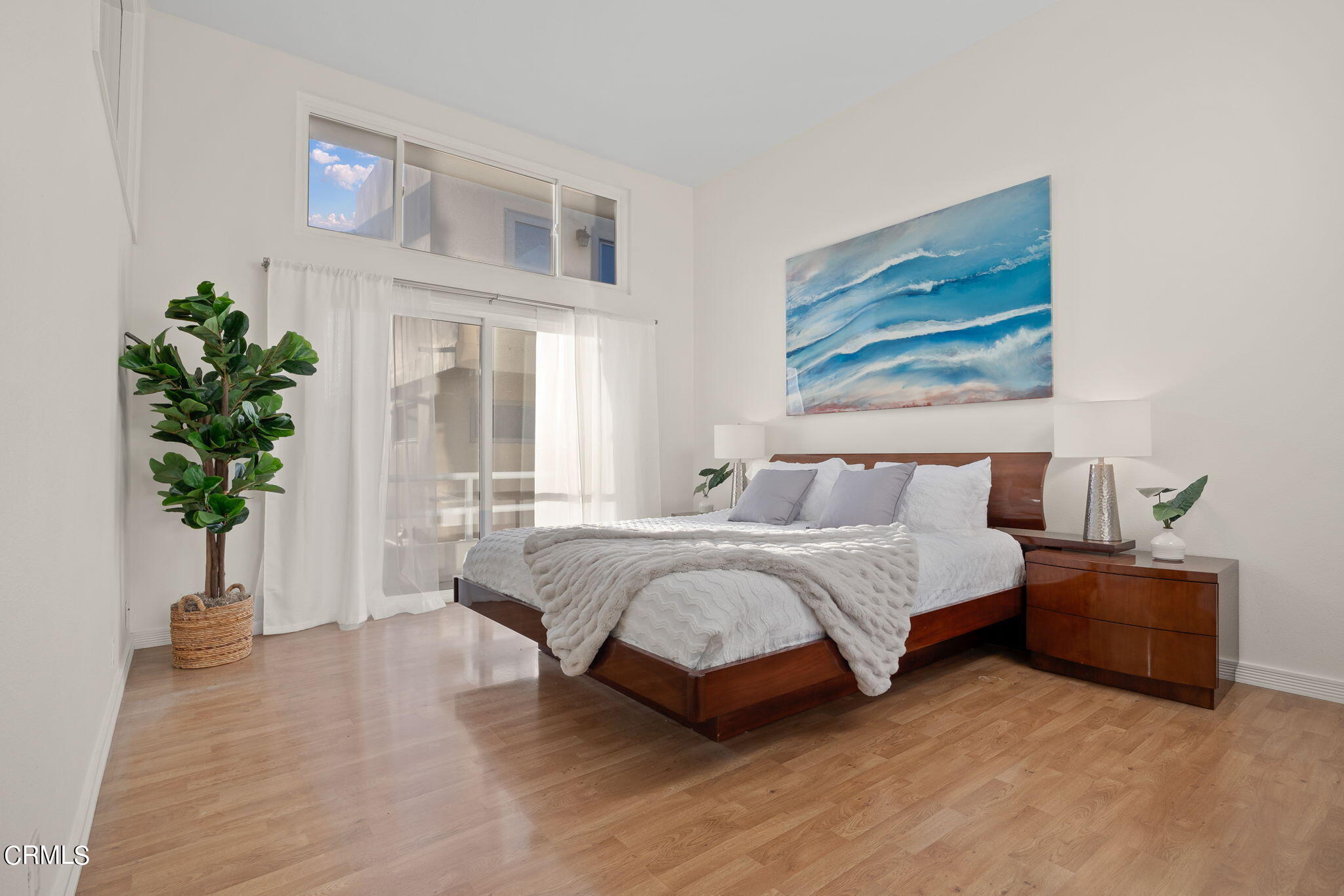 3547 Sunset Lane Oxnard, CA 93035 - Photo 4 of 24 a spacious bedroom with a bed and a potted plant