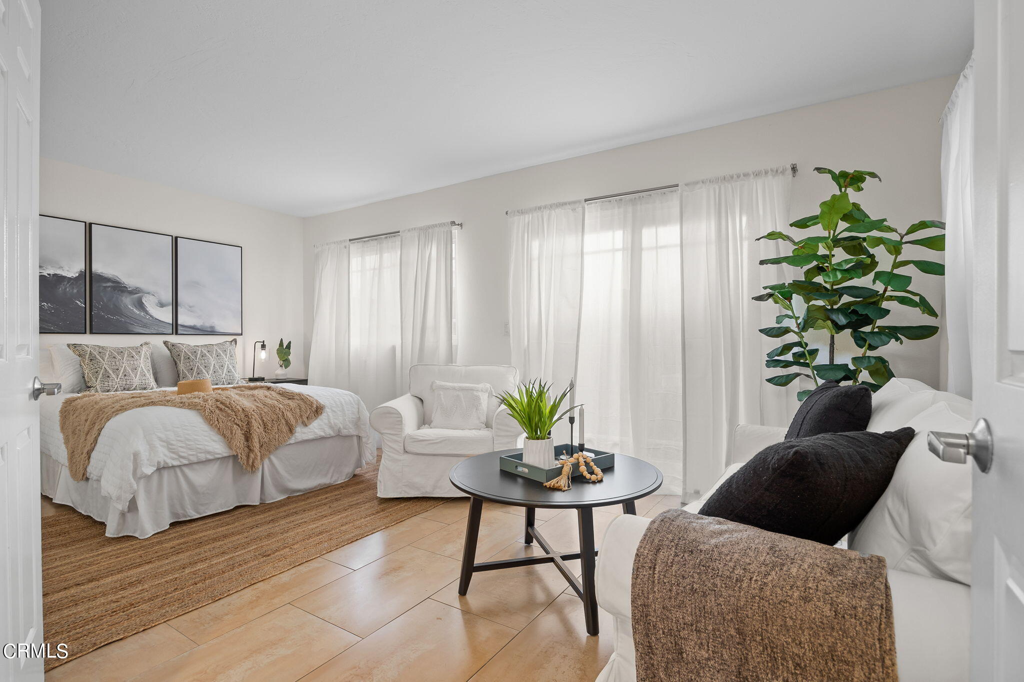 3547 Sunset Lane Oxnard, CA 93035 - Photo 7 of 24 a bedroom with a bed and a couch