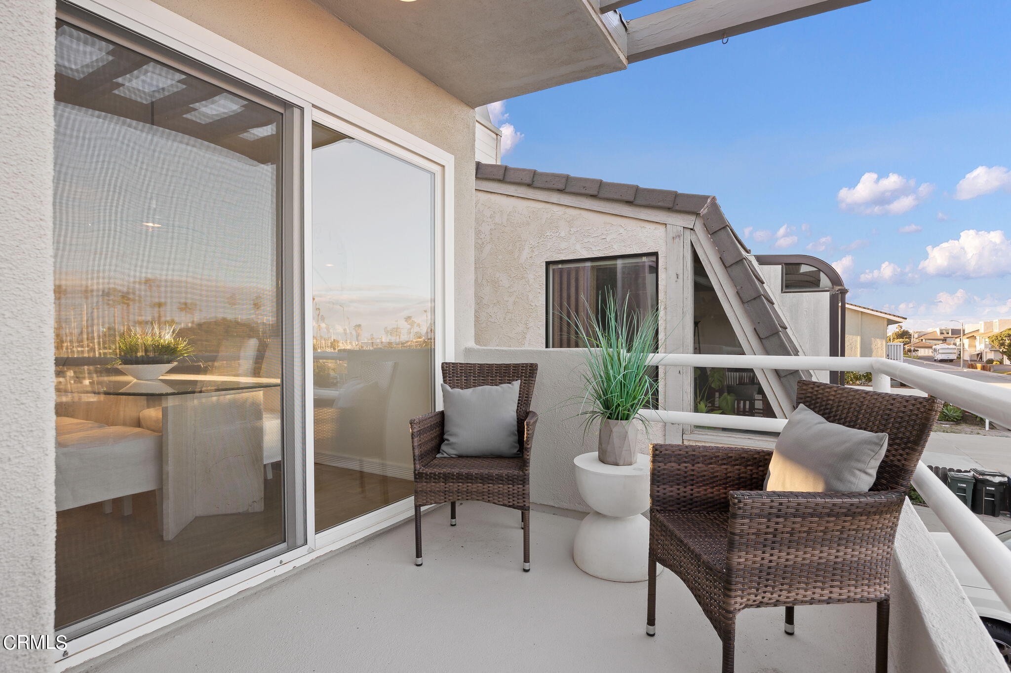 3547 Sunset Lane Oxnard, CA 93035 - Photo 10 of 24 a living room with furniture and a floor to ceiling window