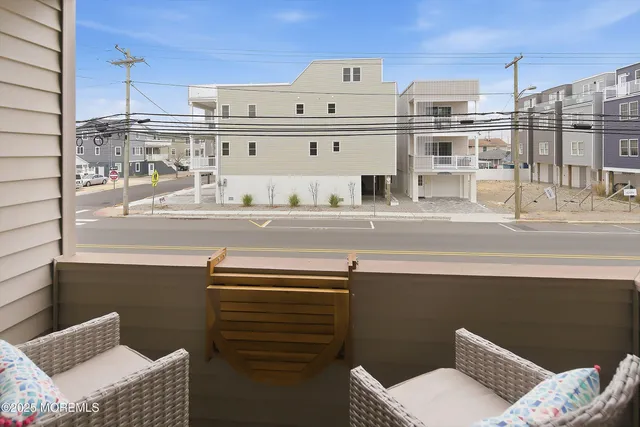 a view of a kitchen with furniture and a rug