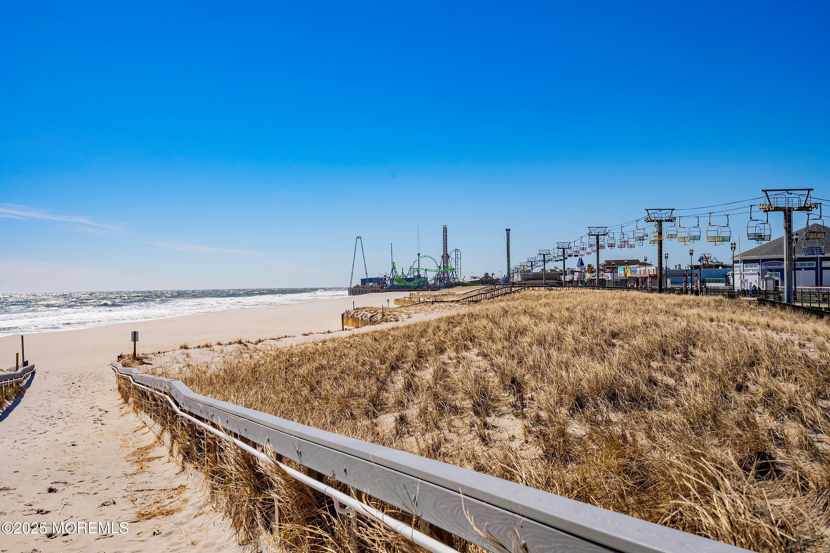 132 Sampson Avenue, Unit 2 Seaside Heights, NJ 08751 - Photo 37 of 41 a view of swimming pool with outdoor seating and yard in back