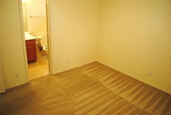 a view of a big room with wooden floor