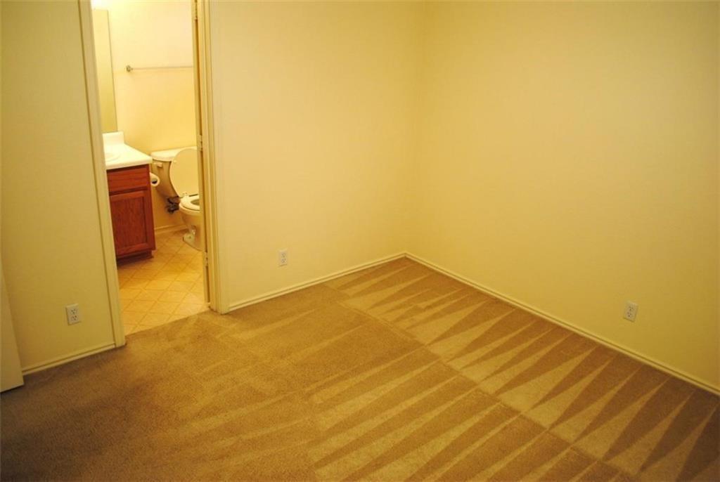 512 Celery Loop Austin, TX 78748 - Photo 18 of 26 a view of a big room with wooden floor