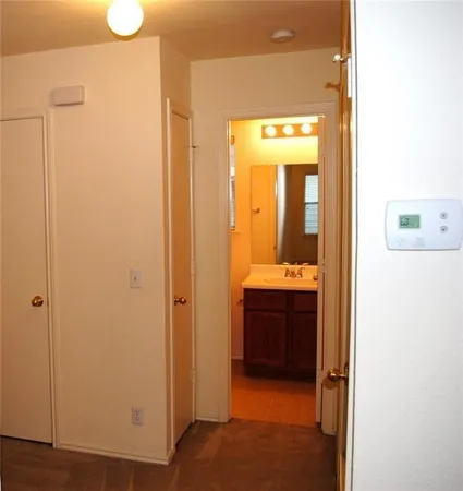 a bathroom with a sink and mirror
