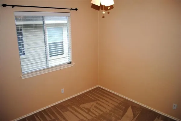 a view of a room with a window