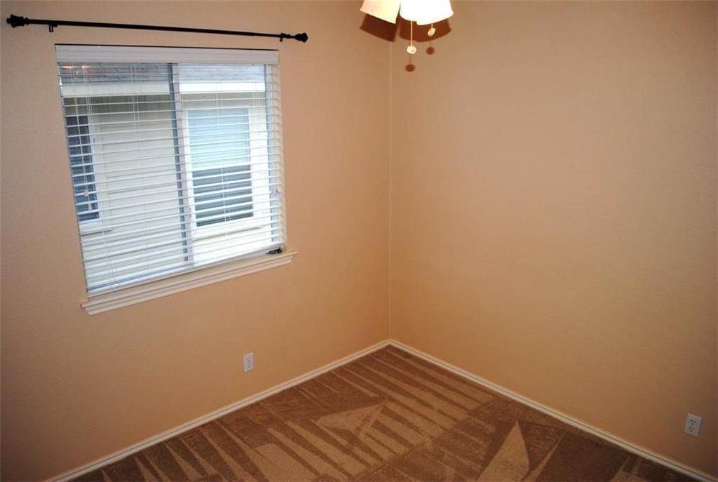 512 Celery Loop Austin, TX 78748 - Photo 24 of 26 a view of a room with a window