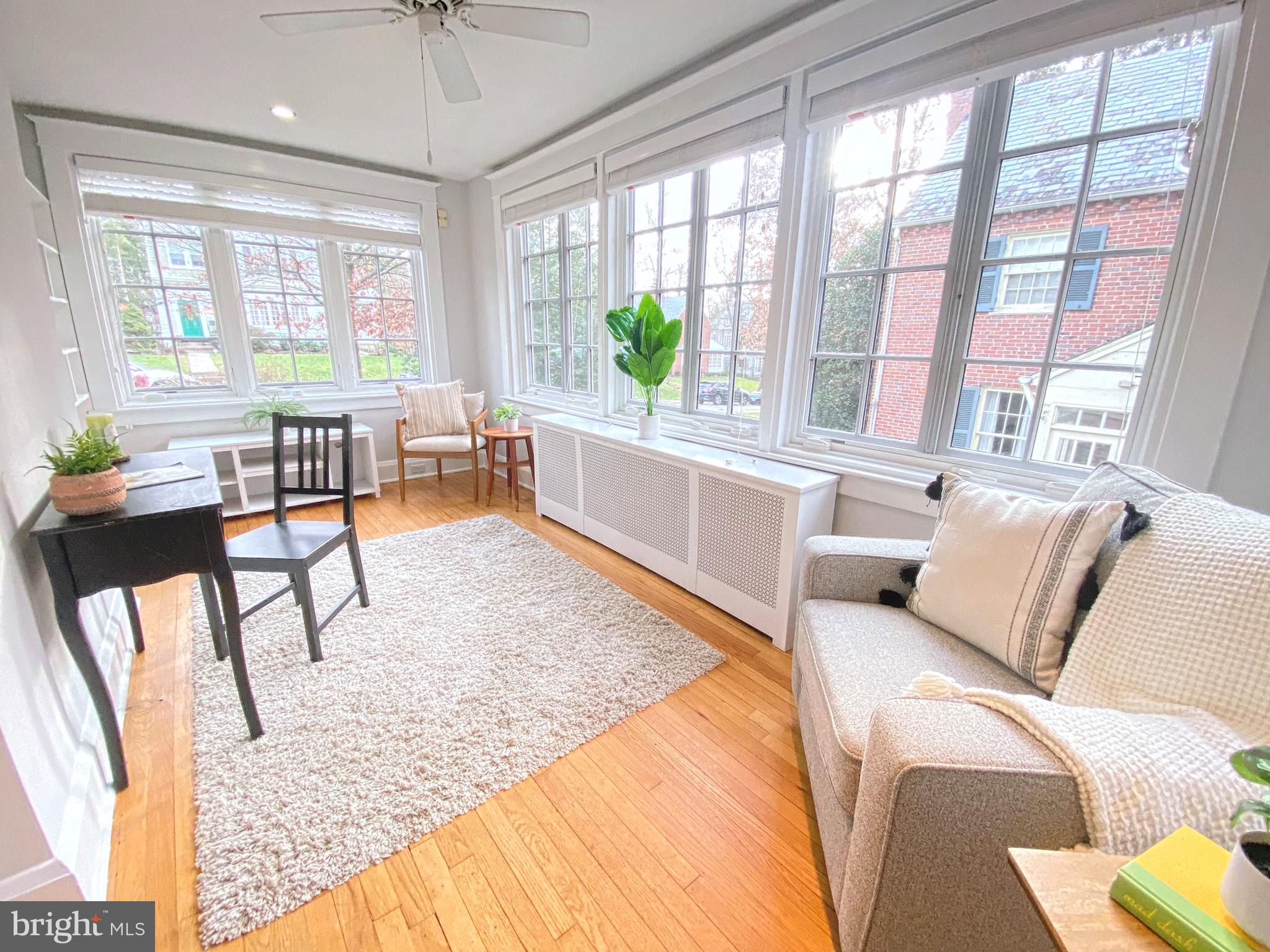 306 St Dunstans Road Baltimore, MD 21212 - Photo 12 of 56 a living room with furniture and a large window