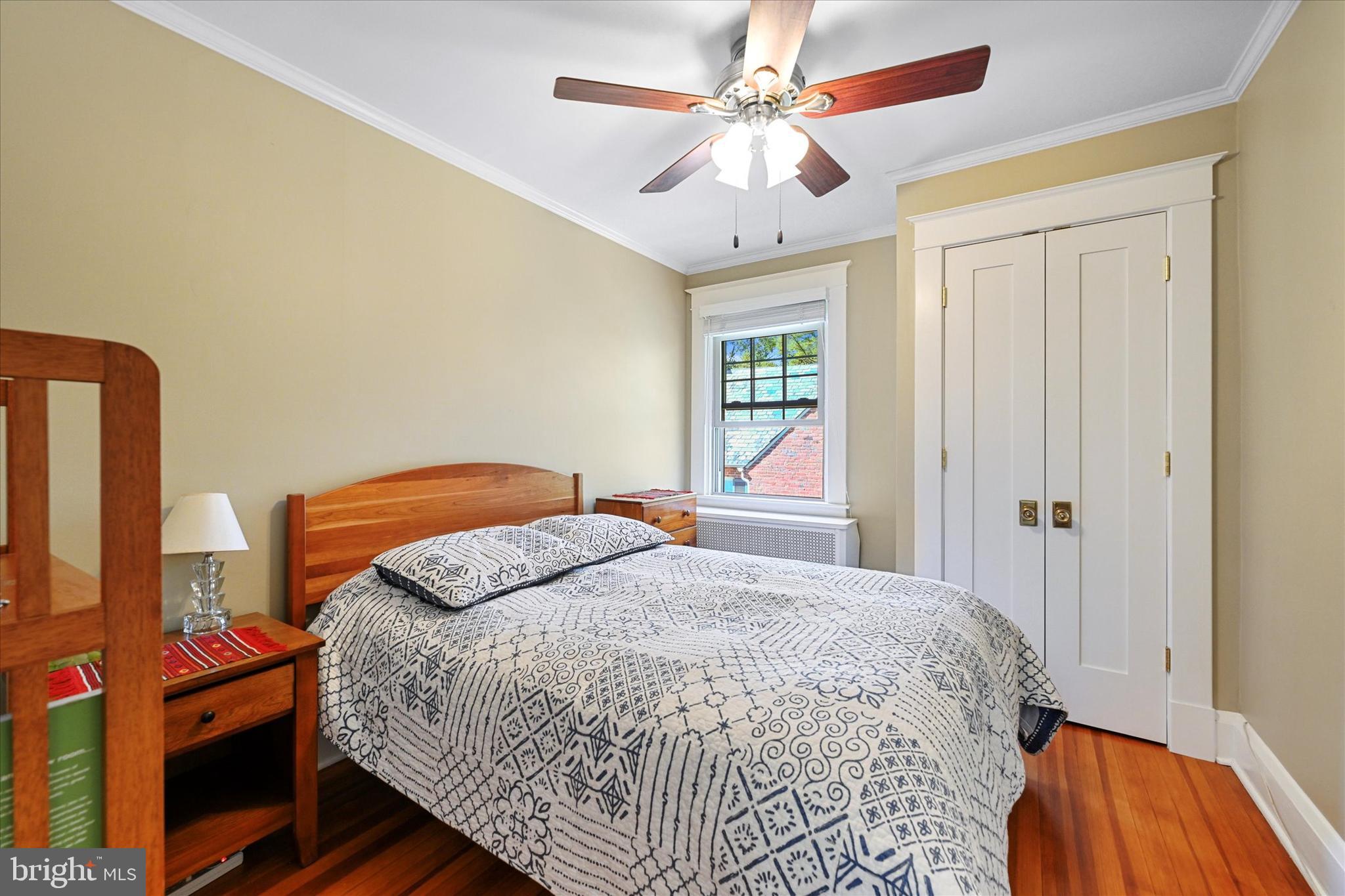 306 St Dunstans Road Baltimore, MD 21212 - Photo 24 of 56 a bedroom with a bed and a chandelier