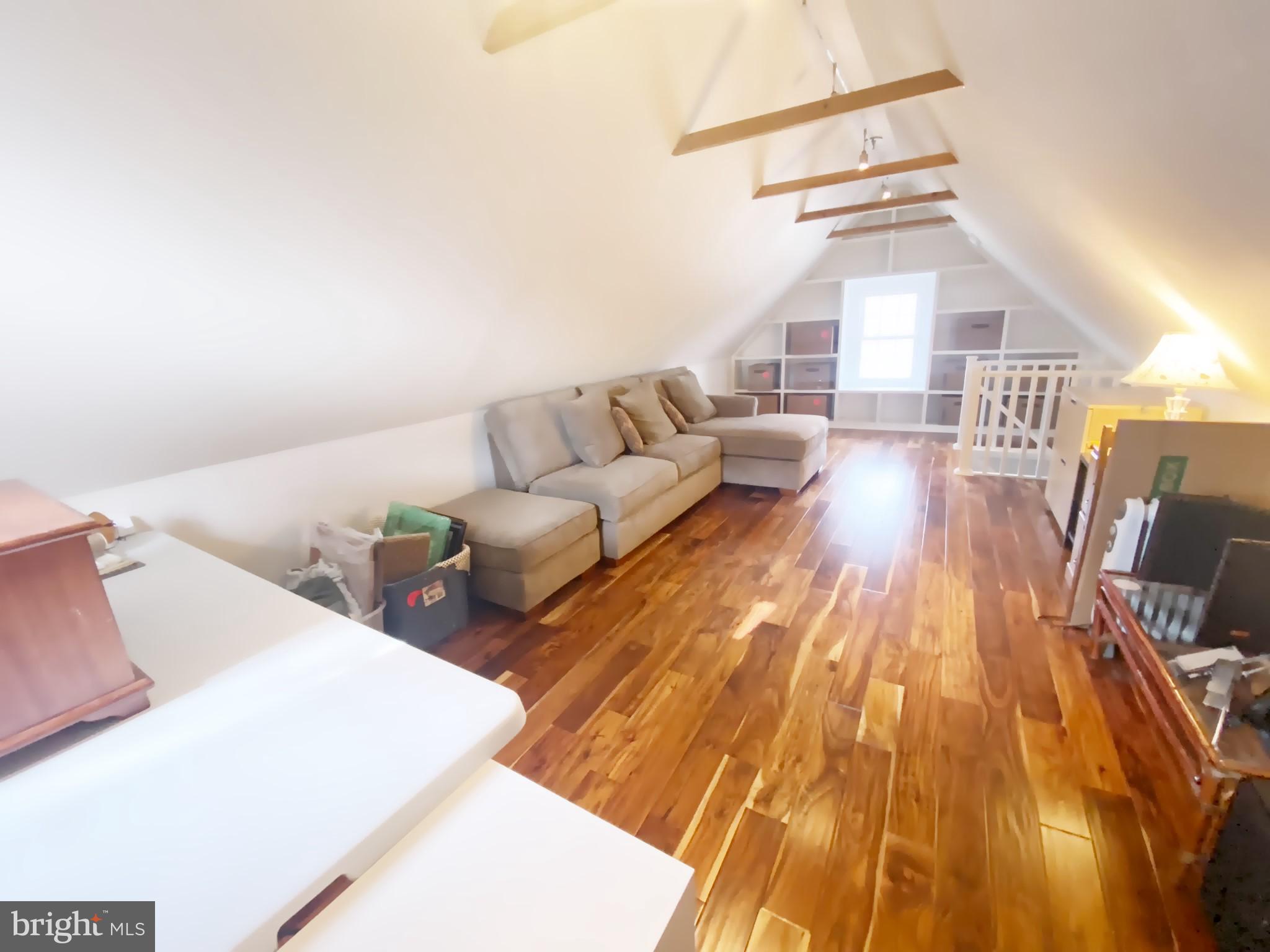 306 St Dunstans Road Baltimore, MD 21212 - Photo 31 of 56 a living room with furniture and a wooden floor