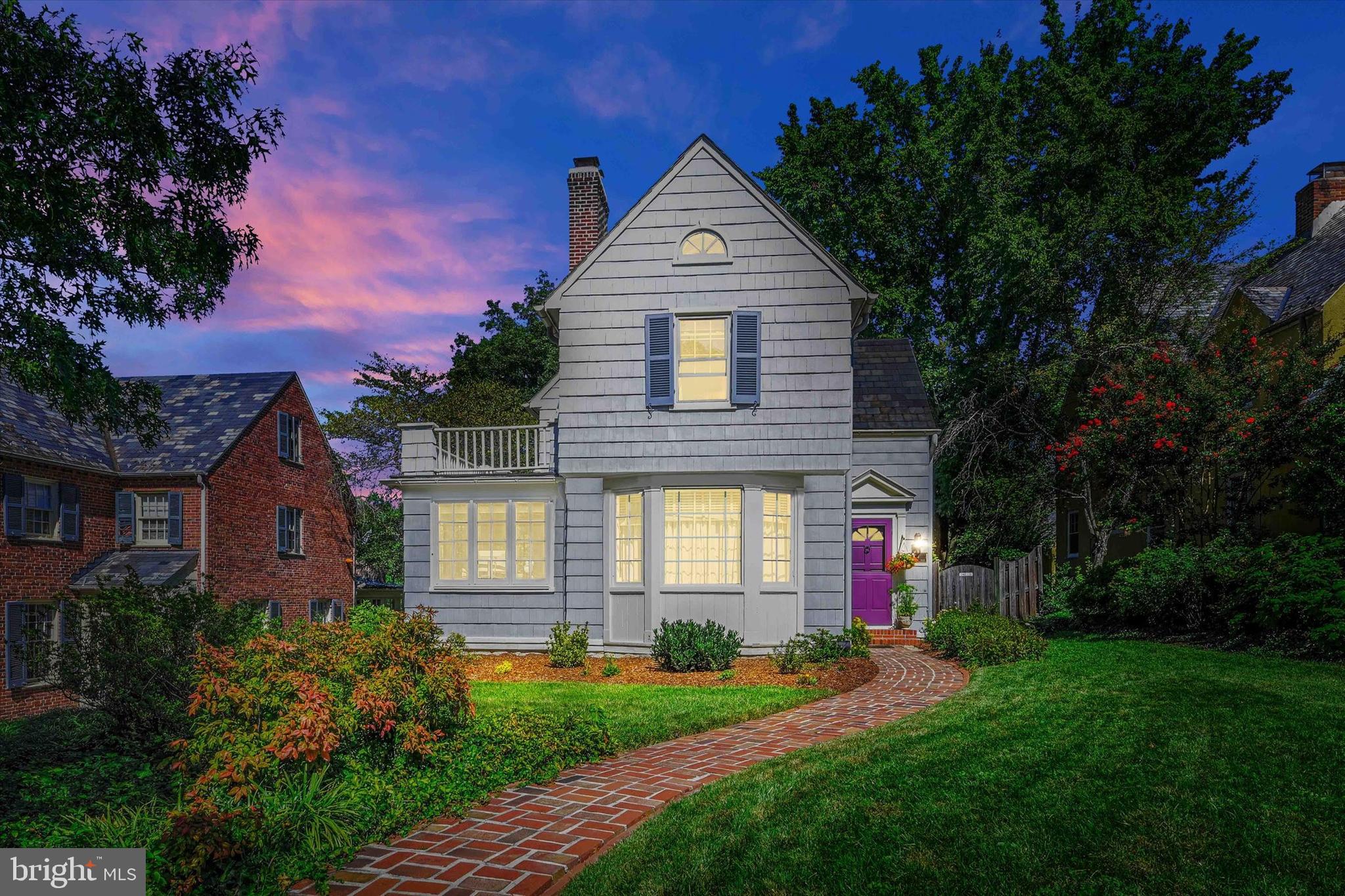 306 St Dunstans Road Baltimore, MD 21212 - Photo 46 of 56 a front view of a house with a yard and outdoor seating