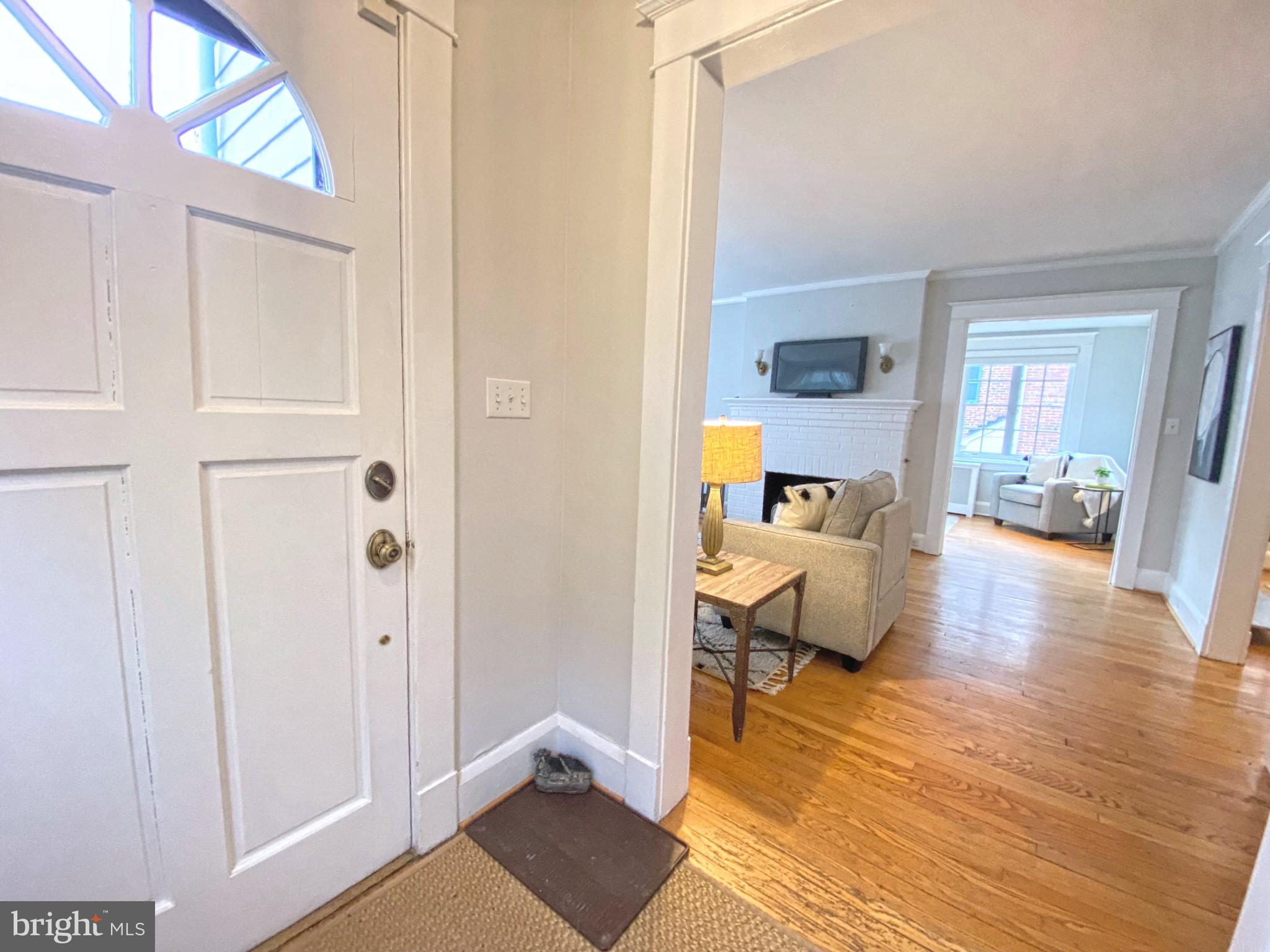 306 St Dunstans Road Baltimore, MD 21212 - Photo 5 of 56 a living room with furniture and a wooden floor