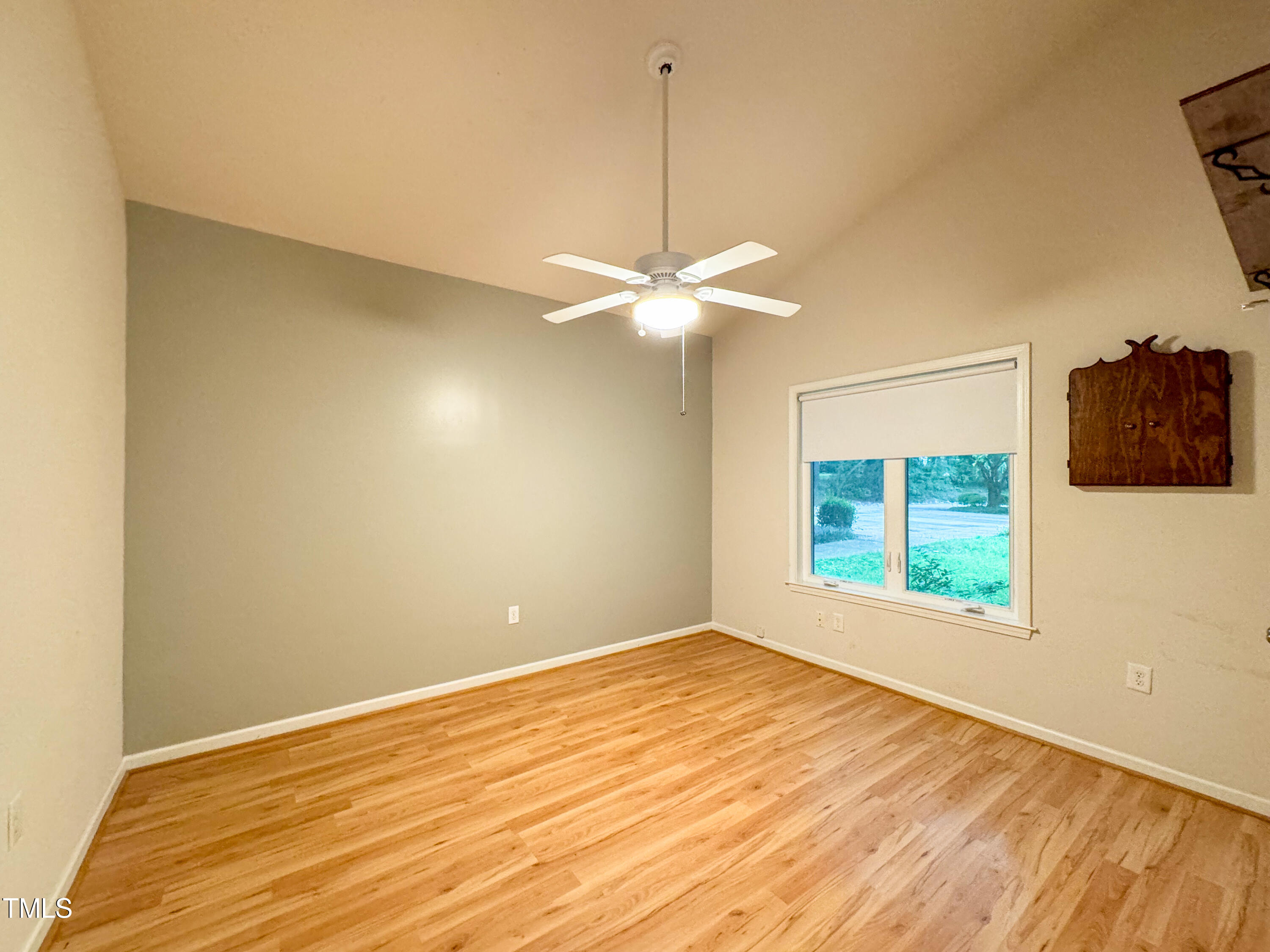 4221 Sunscape Lane Raleigh, NC 27613 - Photo 18 of 29 an empty room with windows and fan