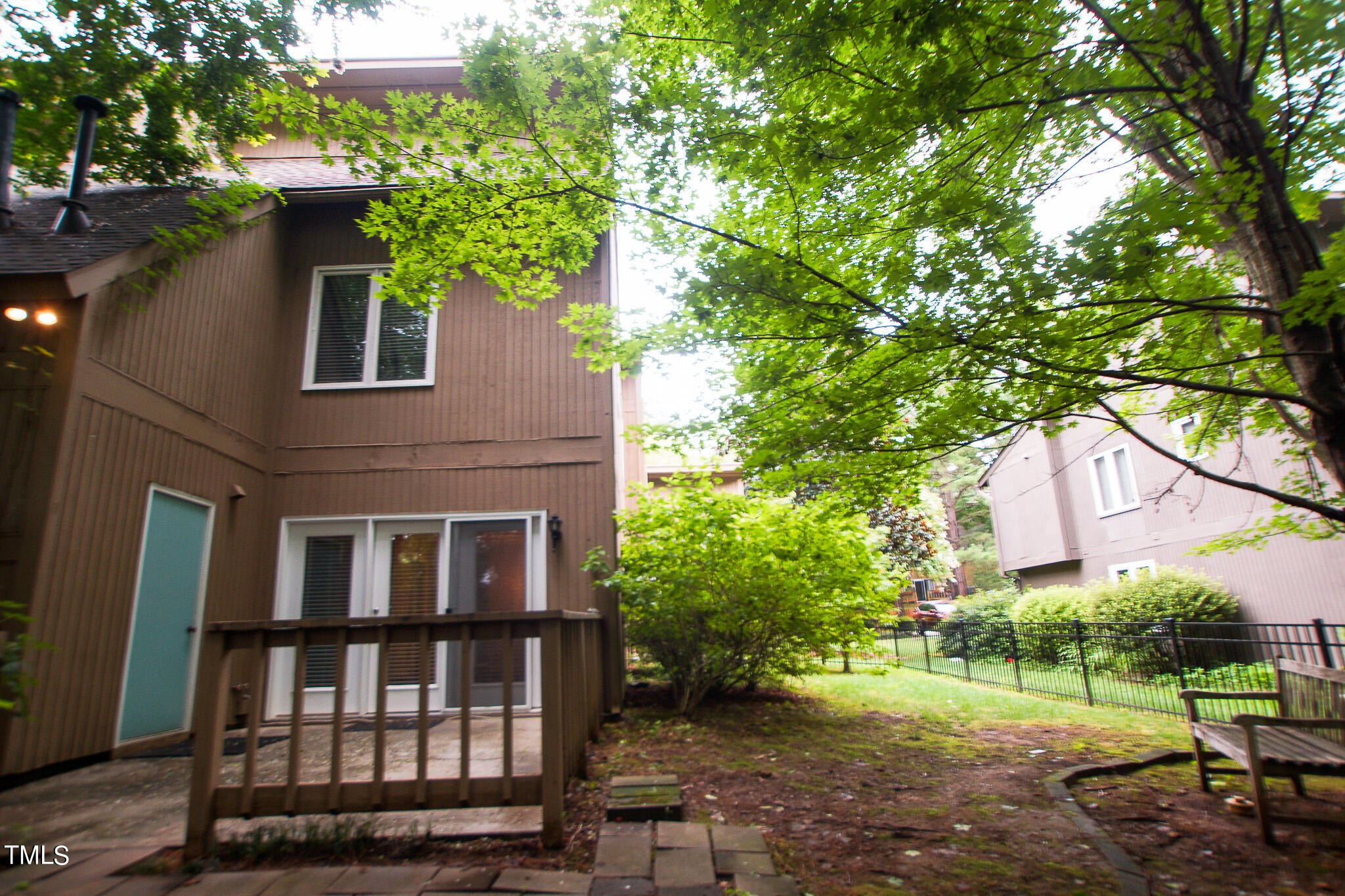 4221 Sunscape Lane Raleigh, NC 27613 - Photo 20 of 29 a front view of a house with a yard
