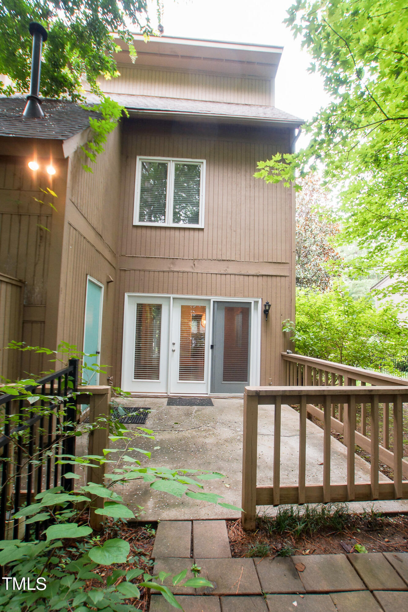 4221 Sunscape Lane Raleigh, NC 27613 - Photo 22 of 29 a view of a house with a porch