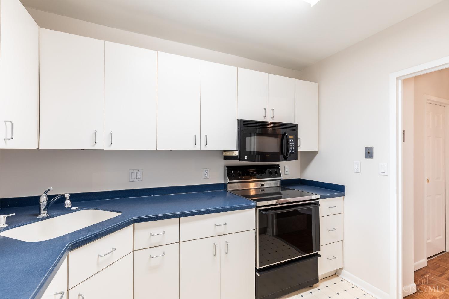2444 Madison Road, Unit 811 Cincinnati, OH 45208 - Photo 14 of 33 Kitchen with solid surface counters. The Regency is easy to work with for updates and have a list of contractors that can help. Move in now or make it your own. There is a service elevator.