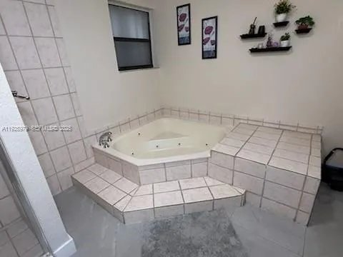 a bathroom with a bathtub