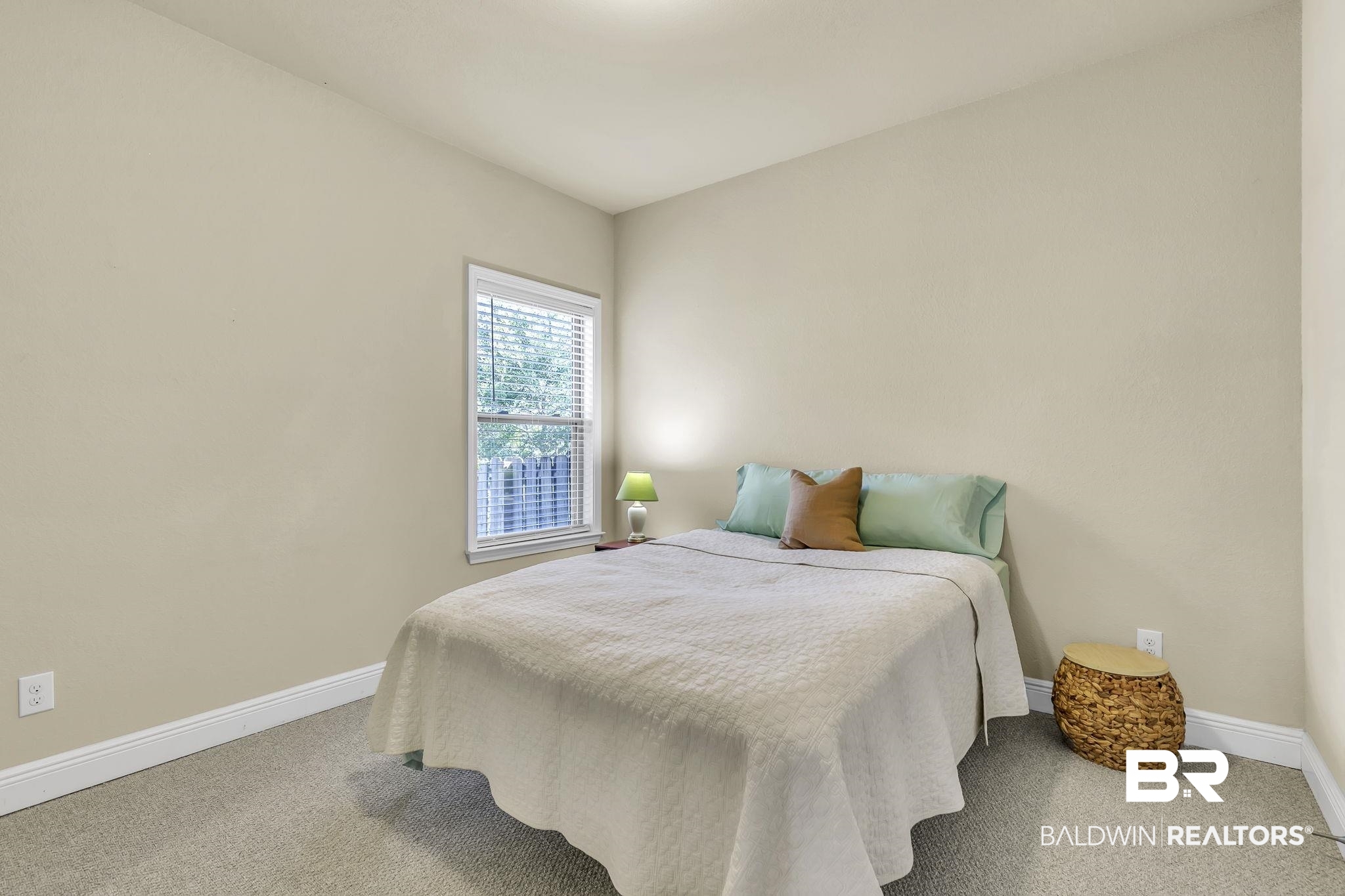 21439 Brick Stack Lane Fairhope, AL 36532 - Photo 22 of 32 Bedroom featuring carpet floors and baseboards