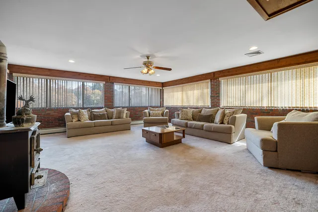 a bathroom with a sink and a window