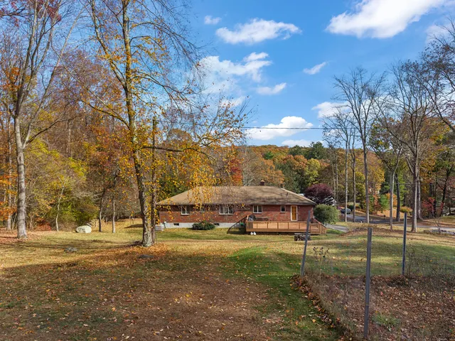a backyard of a house with lots of green space