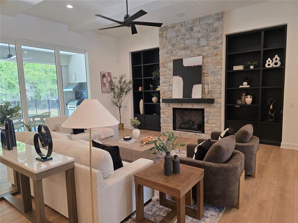 5990 Northwest 88th Street Gainesville, FL 32606 - Photo 3 of 11 a living room with furniture and a fireplace