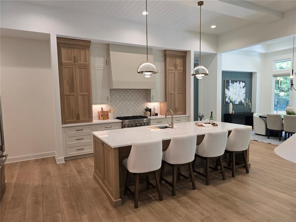 5990 Northwest 88th Street Gainesville, FL 32606 - Photo 5 of 11 a view of a dining room and livingroom with furniture wooden floor a chandelier