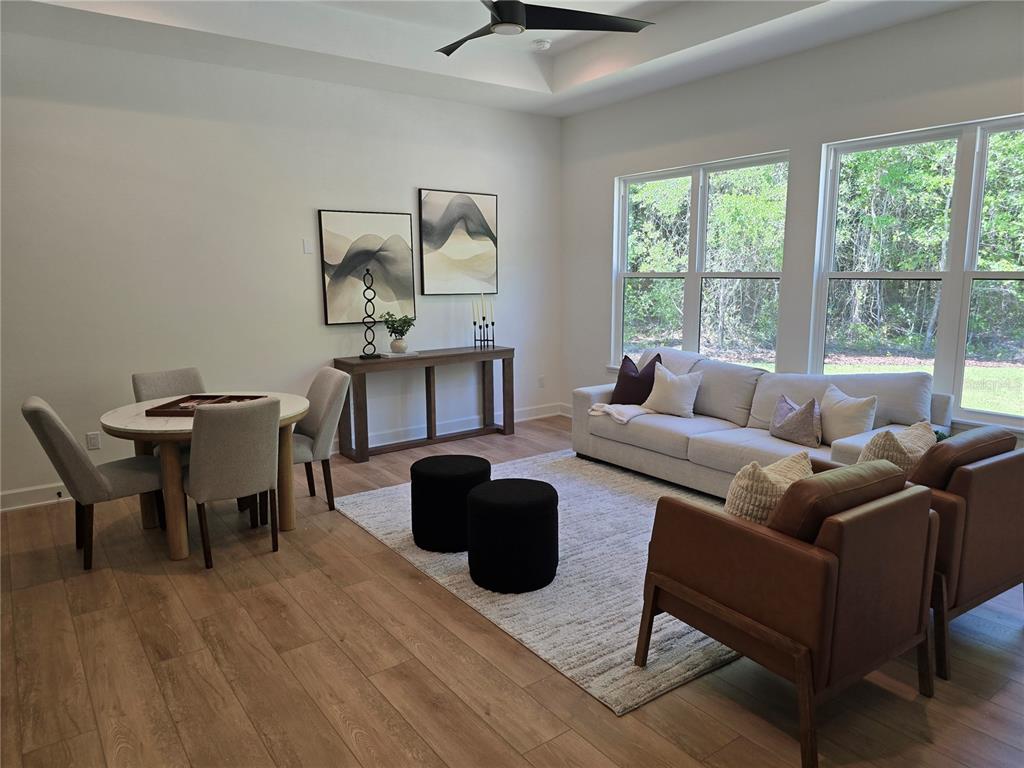 5990 Northwest 88th Street Gainesville, FL 32606 - Photo 6 of 11 a living room with furniture and a window