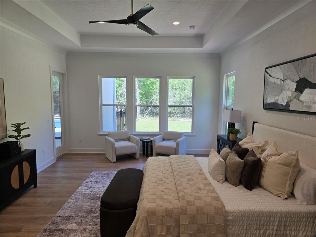 5990 Northwest 88th Street Gainesville, FL 32606 - Photo 9 of 11 a bedroom with double bed and a couch