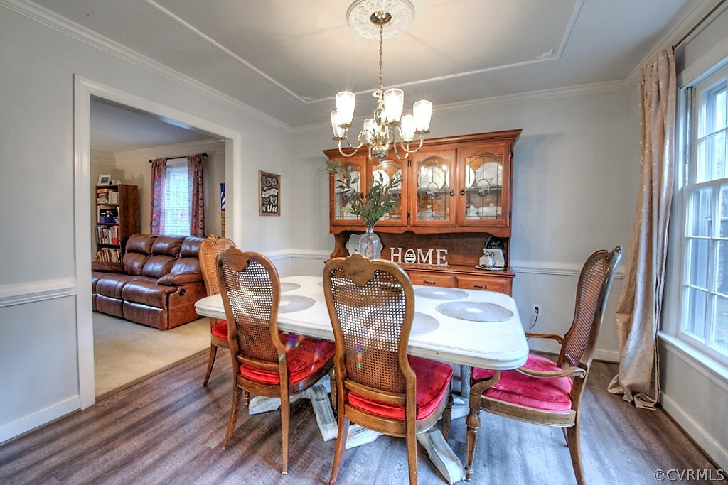 3919 Pebble Creek Road Midlothian, VA 23112 - Photo 11 of 46 a view of a dining room with furniture window and wooden floor