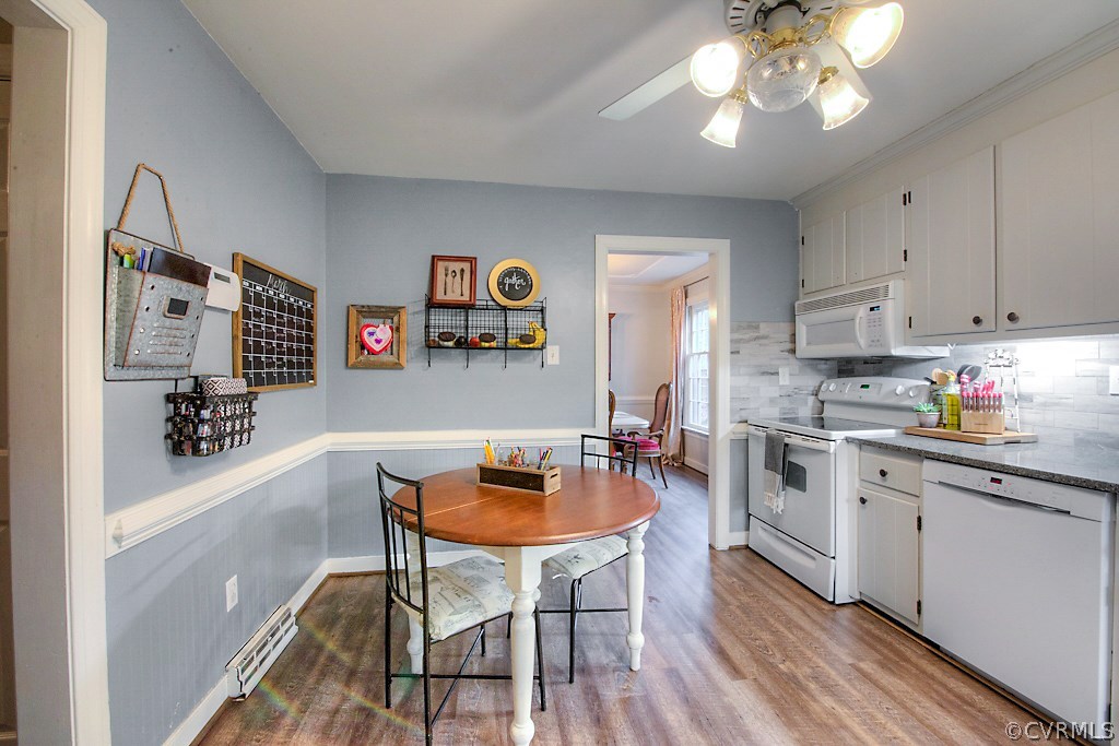 3919 Pebble Creek Road Midlothian, VA 23112 - Photo 17 of 46 a view of a dining room with furniture and chandelier