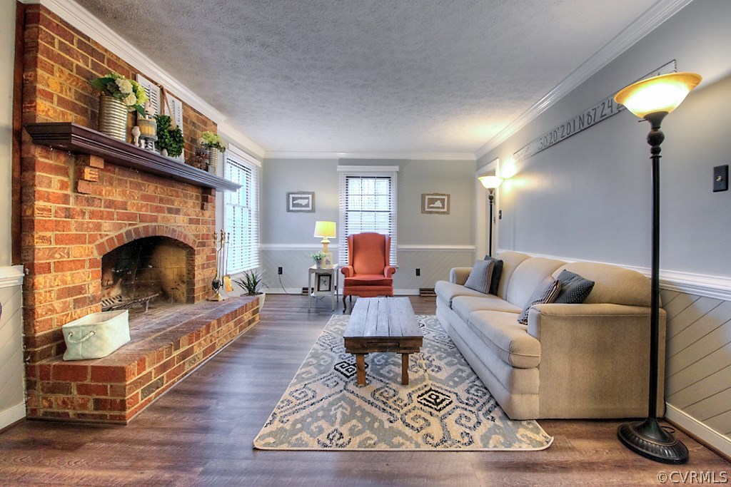 3919 Pebble Creek Road Midlothian, VA 23112 - Photo 18 of 46 a living room with furniture and a fireplace