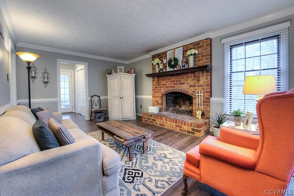 3919 Pebble Creek Road Midlothian, VA 23112 - Photo 20 of 46 a living room with furniture and a fireplace