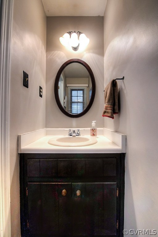 3919 Pebble Creek Road Midlothian, VA 23112 - Photo 23 of 46 a bathroom with a sink and a mirror