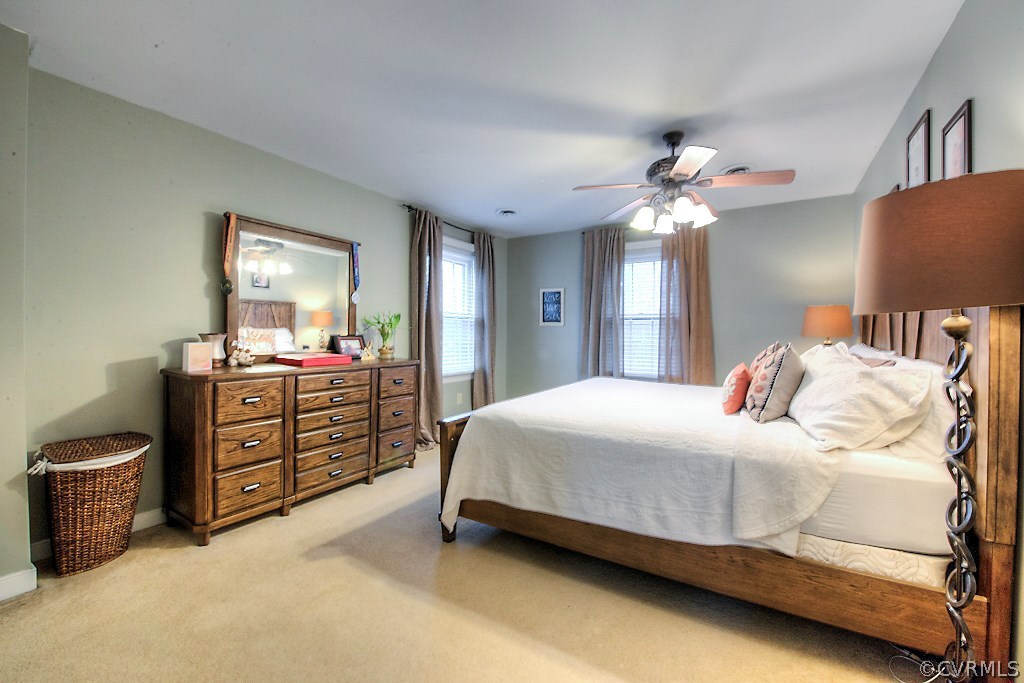 3919 Pebble Creek Road Midlothian, VA 23112 - Photo 31 of 46 a bedroom with a bed dresser and a window